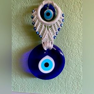 Beautiful handwoven evil eye sun catcher!